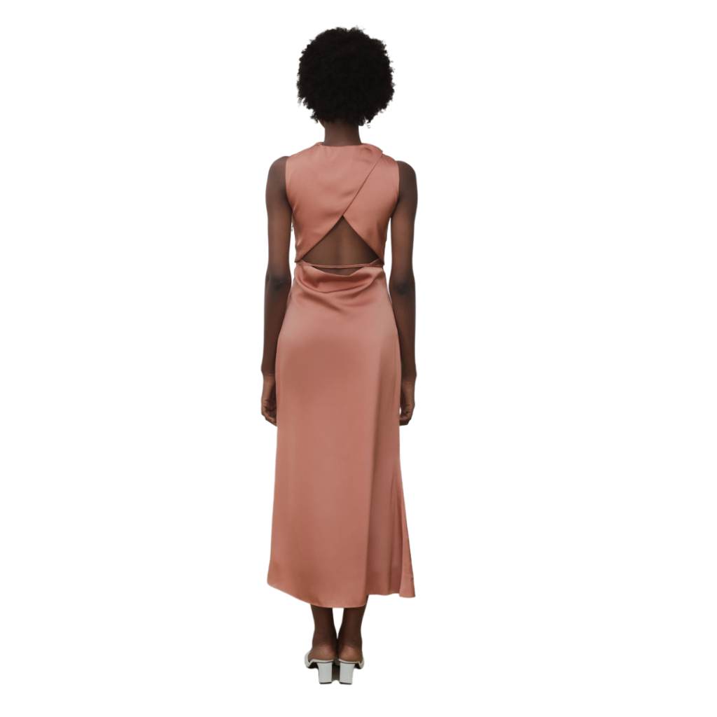 The back of a model wearing a rose gold dress
