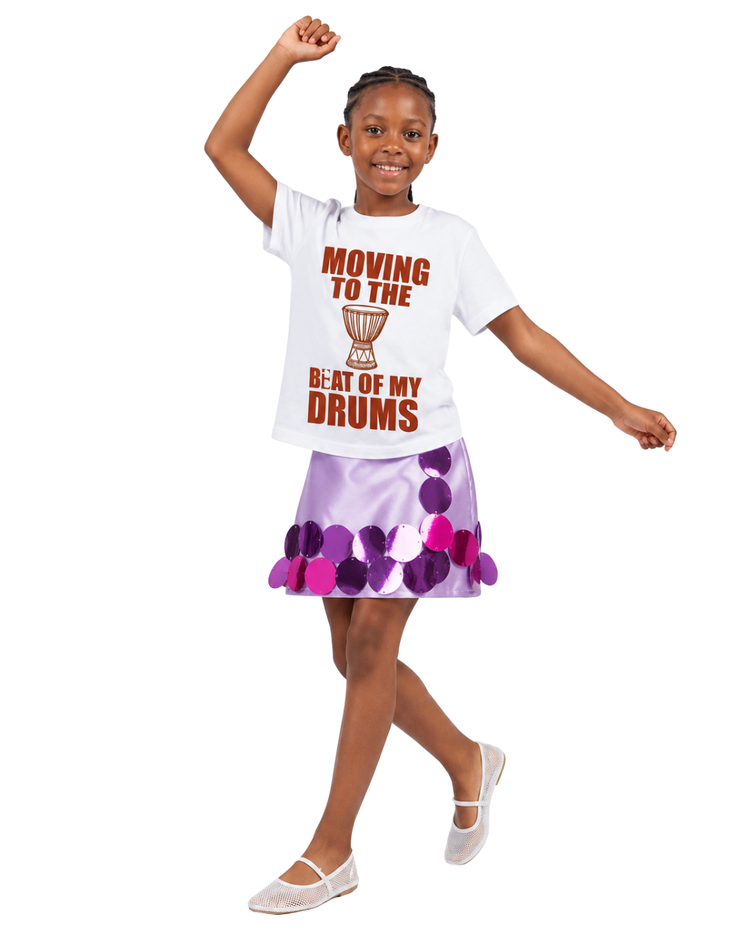 Young girl wearing the Bàtá graphic tee paired with the Adunni sequin skort in lilac and pink from Imad Eduso Kids.