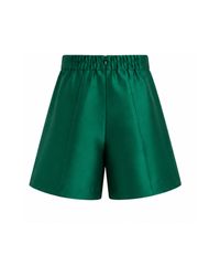 Emerald green tailored kids shorts back view with structured waistband and clean pleated silhouette