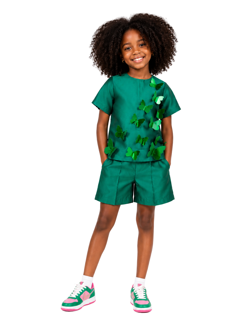Young girl wearing the Gabby Butterfly Shorts Set featuring 3D butterfly embellishments on emerald green co-ords from Imad Eduso Kids.
