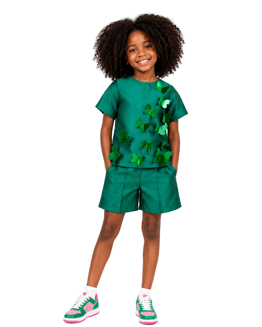 Young girl wearing the Gabby Butterfly Shorts Set featuring 3D butterfly embellishments on emerald green co-ords from Imad Eduso Kids.