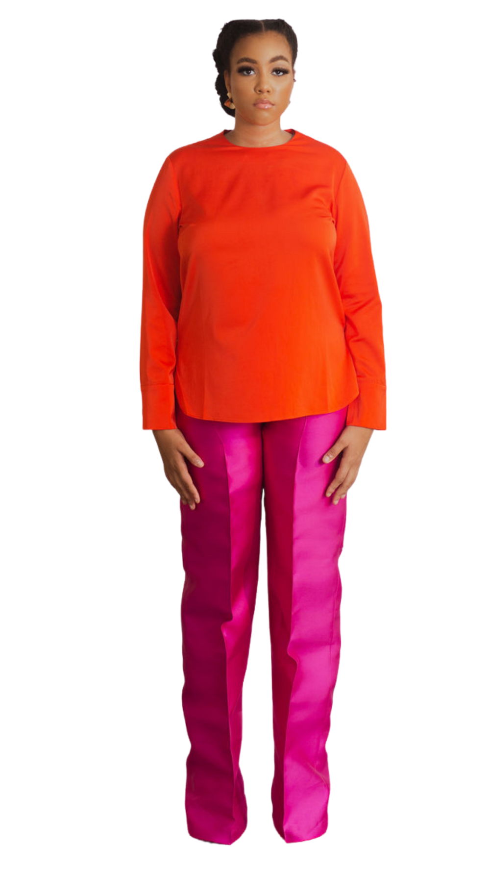 A model wearing an Orange Top and a Magenta straight-cut pant