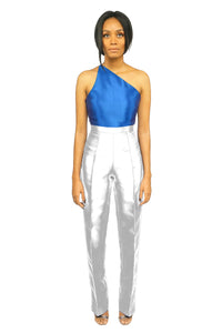 A model wearing a one-shoulder Blue Top and a white high waist straight cut pant