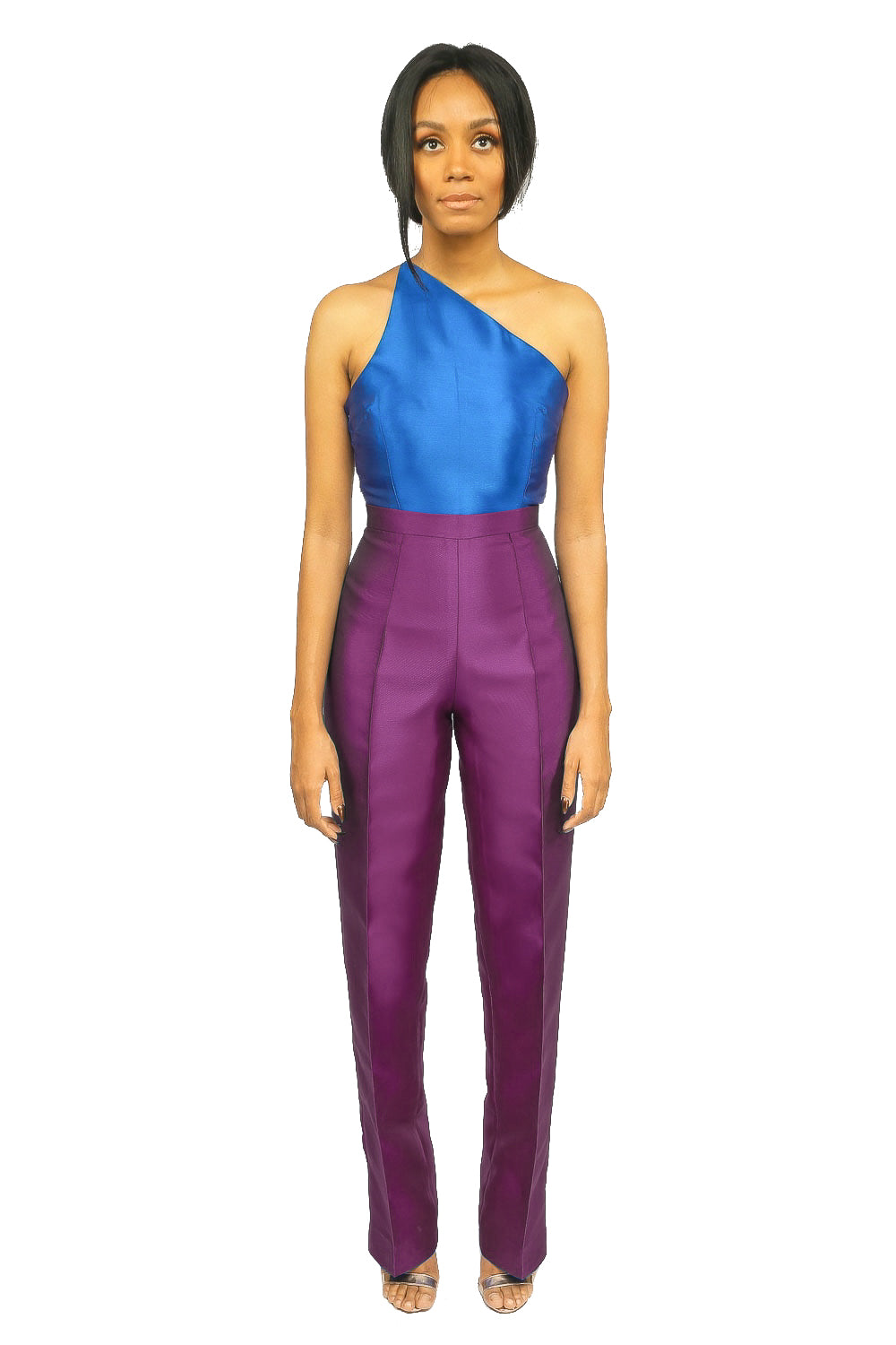A model wearing a one-shoulder Blue Top and a purple high waist straight cut pant