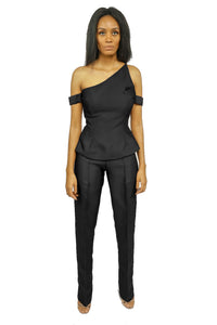 A model wearing a black Cold Shoulder Top with black pants