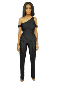 A model wearing a one-shoulder black top and a Black high waist straight cut pant