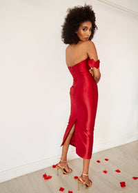The back of a model wearing a fitted mid-length Wine halter neck dress