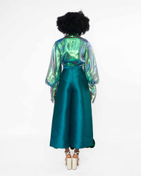 The back of a model wearing an Iridescent Green top and a Green pant with sequins embellished